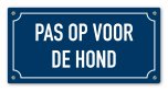 Tekstbord Pas op voor de hond